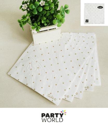 white napkins with gold dotts